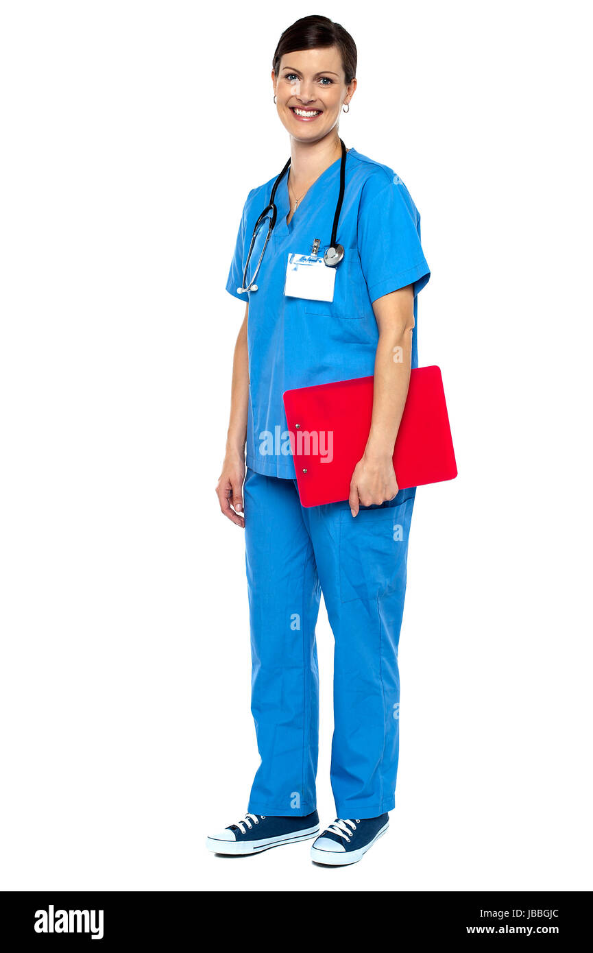 Nurse wearing blue uniform and holding red clipboard. Full length