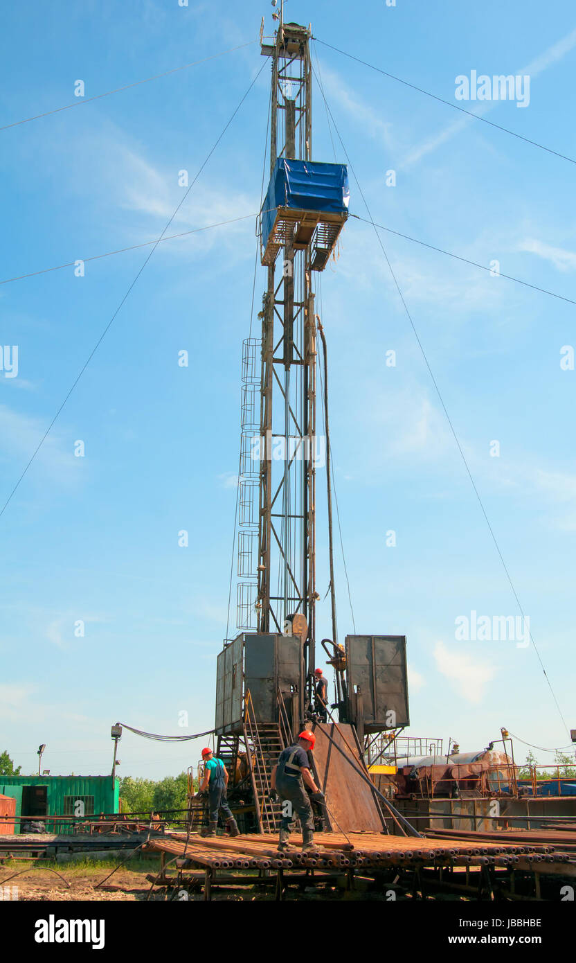 oil field, the oil workers are working Stock Photo