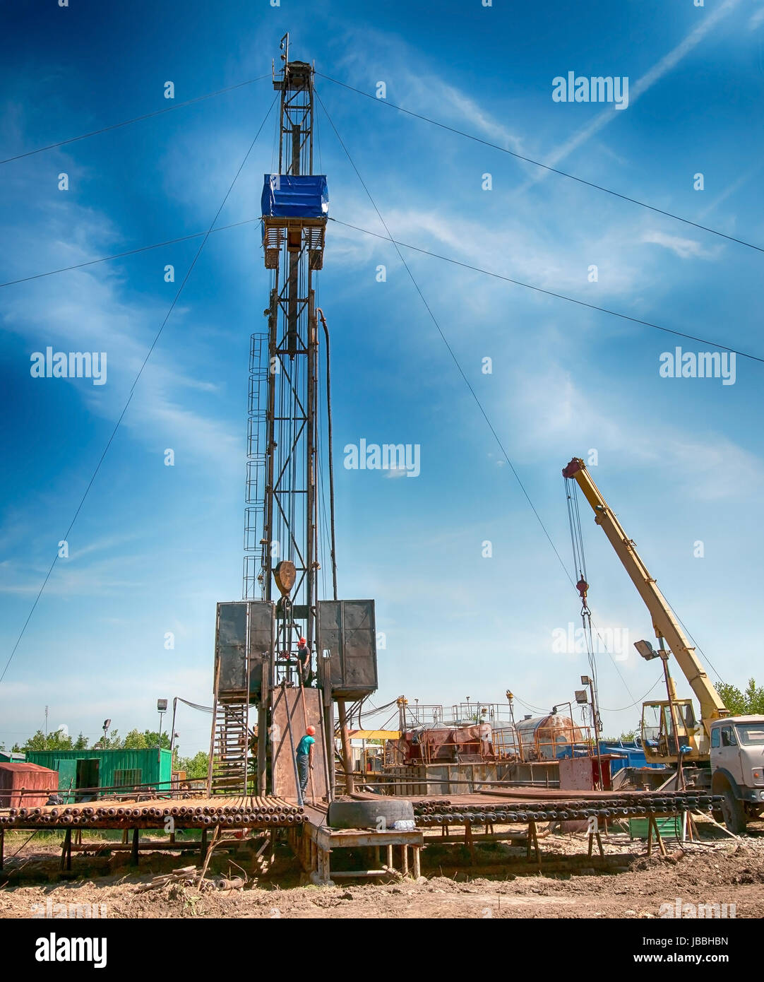 oil field, the oil workers are working Stock Photo