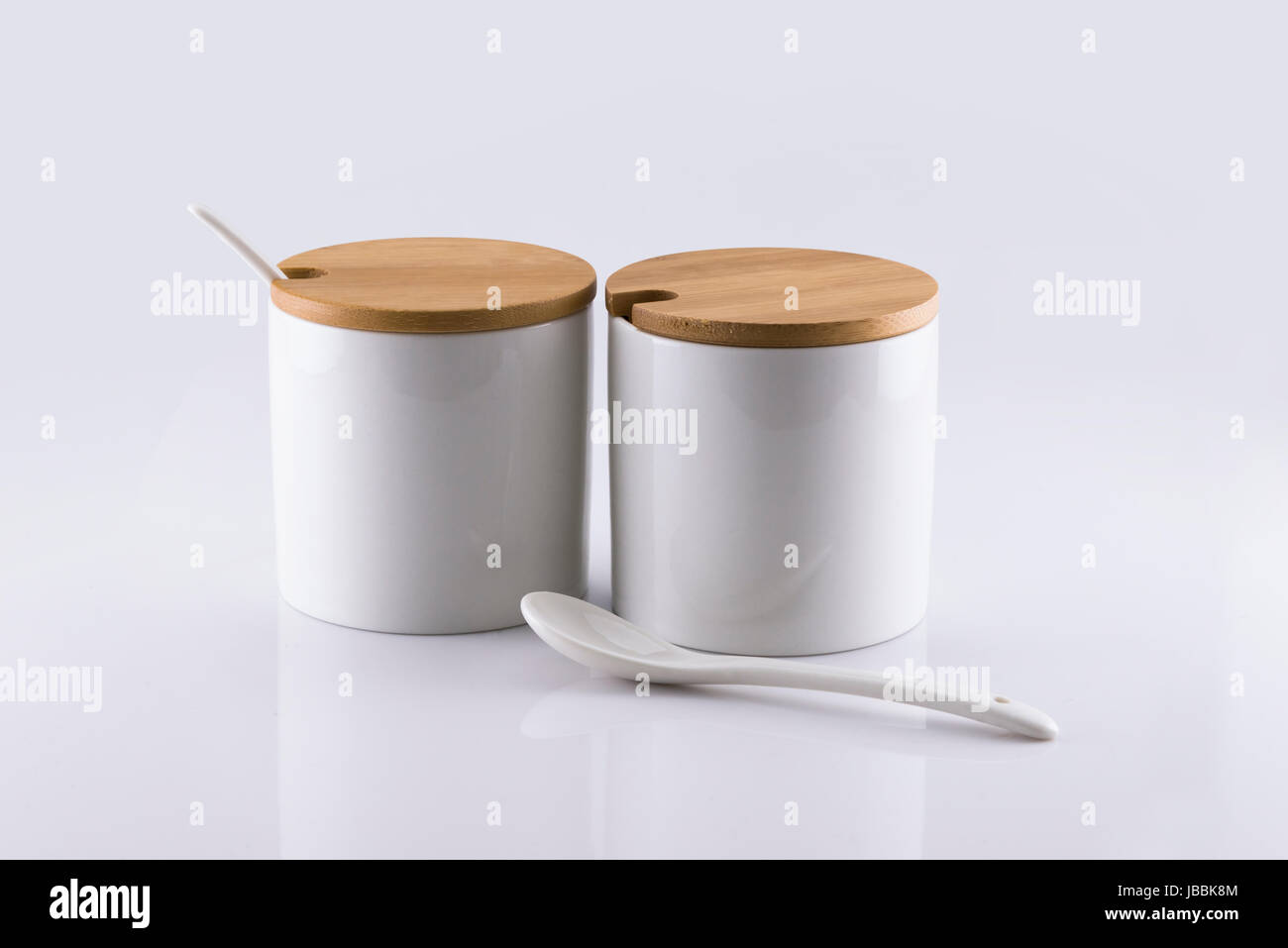 Two white ceramic cup for placing condiments Stock Photo Alamy