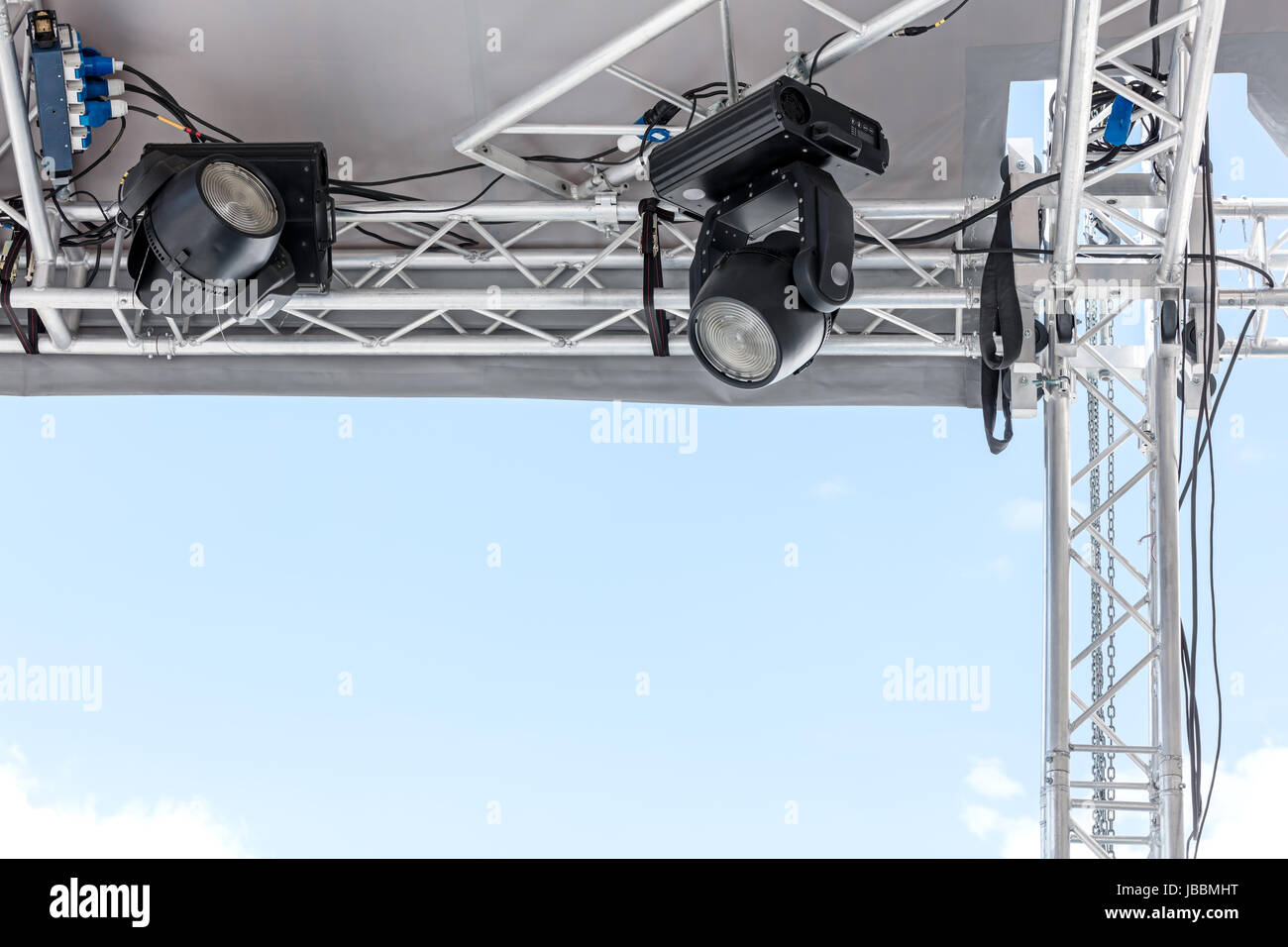 stage spotlights mounted on street scene lighting rig Stock Photo Alamy