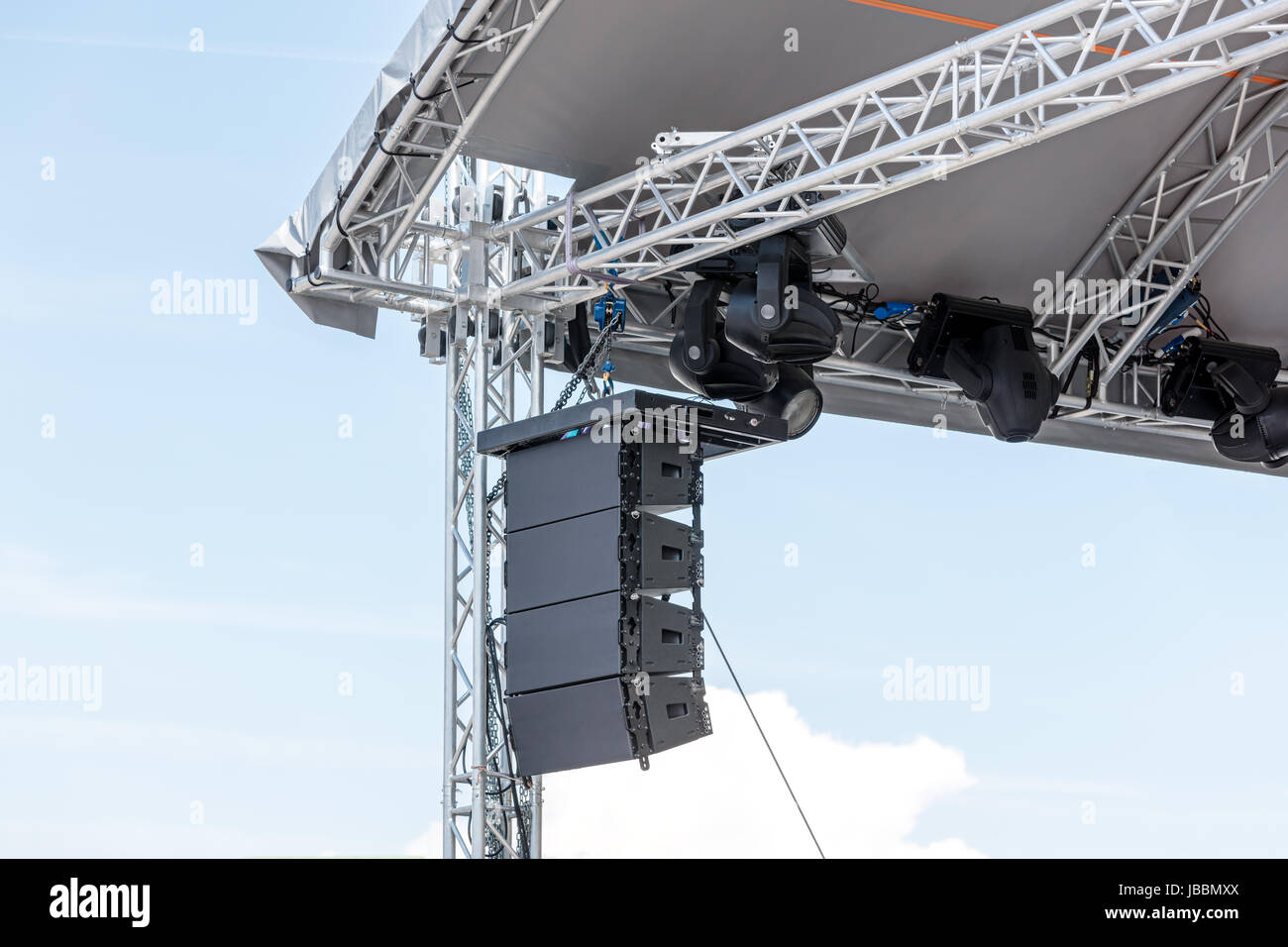 outdoor stage with professional spotlight and sound equipment Stock Photo