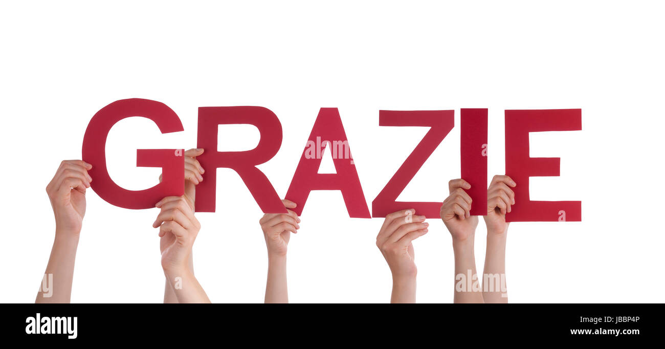 Many People Holding the Italian Word Grazie which means Thanks, Isolated Stock Photo