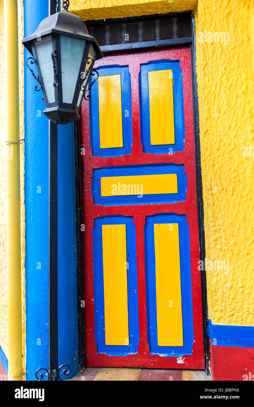 Brightly colored door in the colors of the Colombian flag in Medellin,  Colombia Stock Photo - Alamy