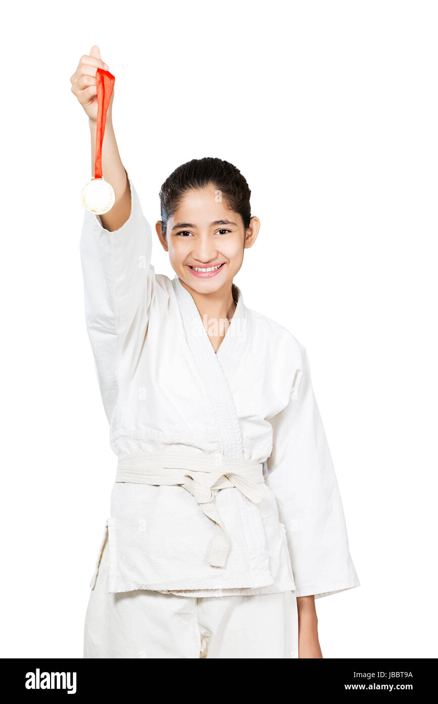 Happy 1 Indian Teenager Girl JUdo Martial Arts Student Showing Medal Winning Success Celebration Stock Photo