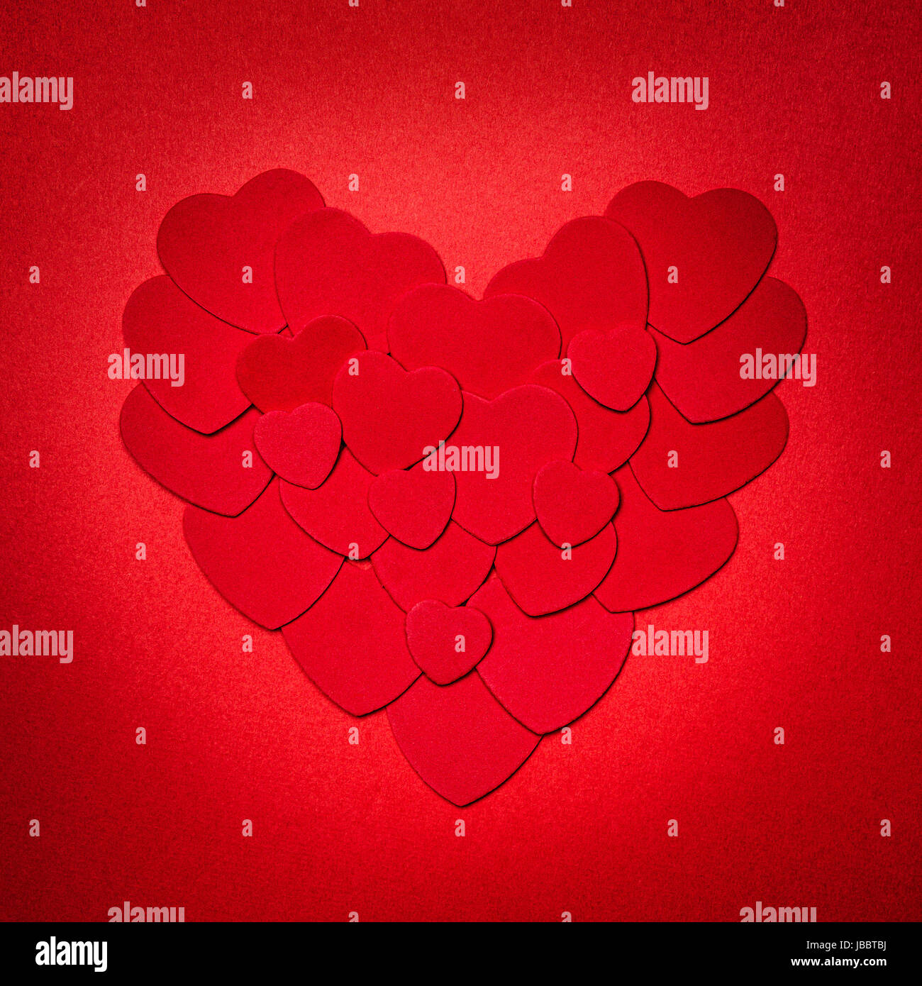 Romantic heart made of many smaller red paper hearts for valentines day ...