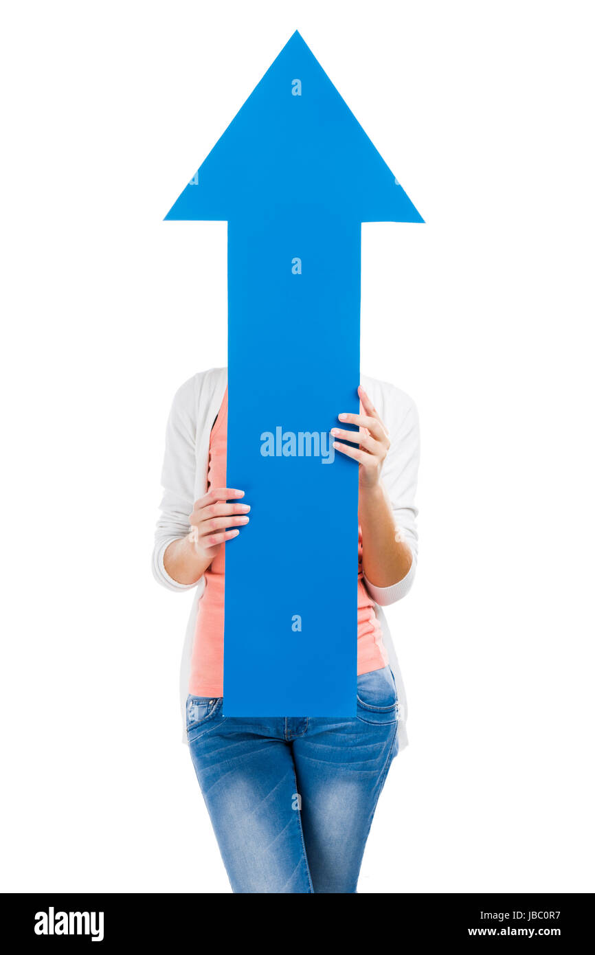Beautiful blonde woman holding a blue arrow pointing up Stock Photo - Alamy