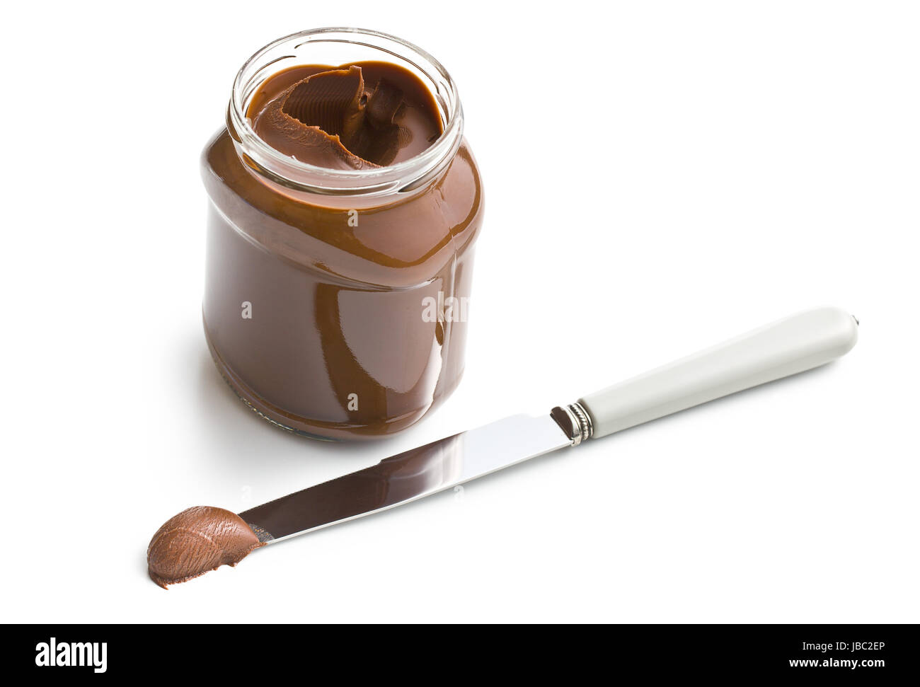 chocolate spread in jar on white background Stock Photo Alamy