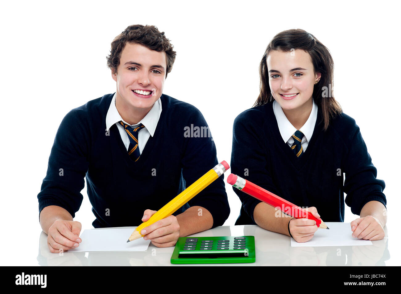 Boy and girl are ready to take up the general knowledge quest Stock Photo