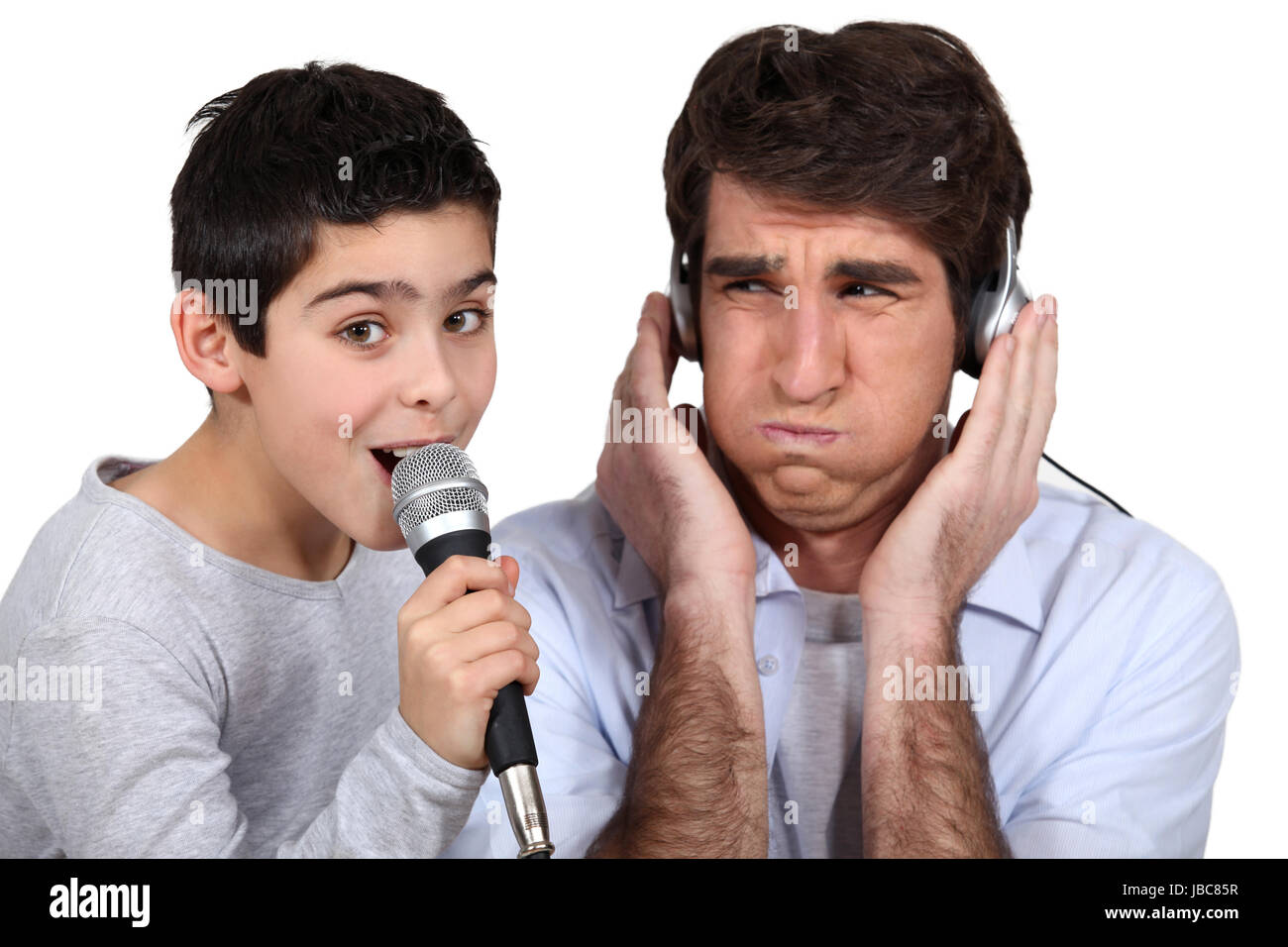 Bad singer with father Stock Photo - Alamy