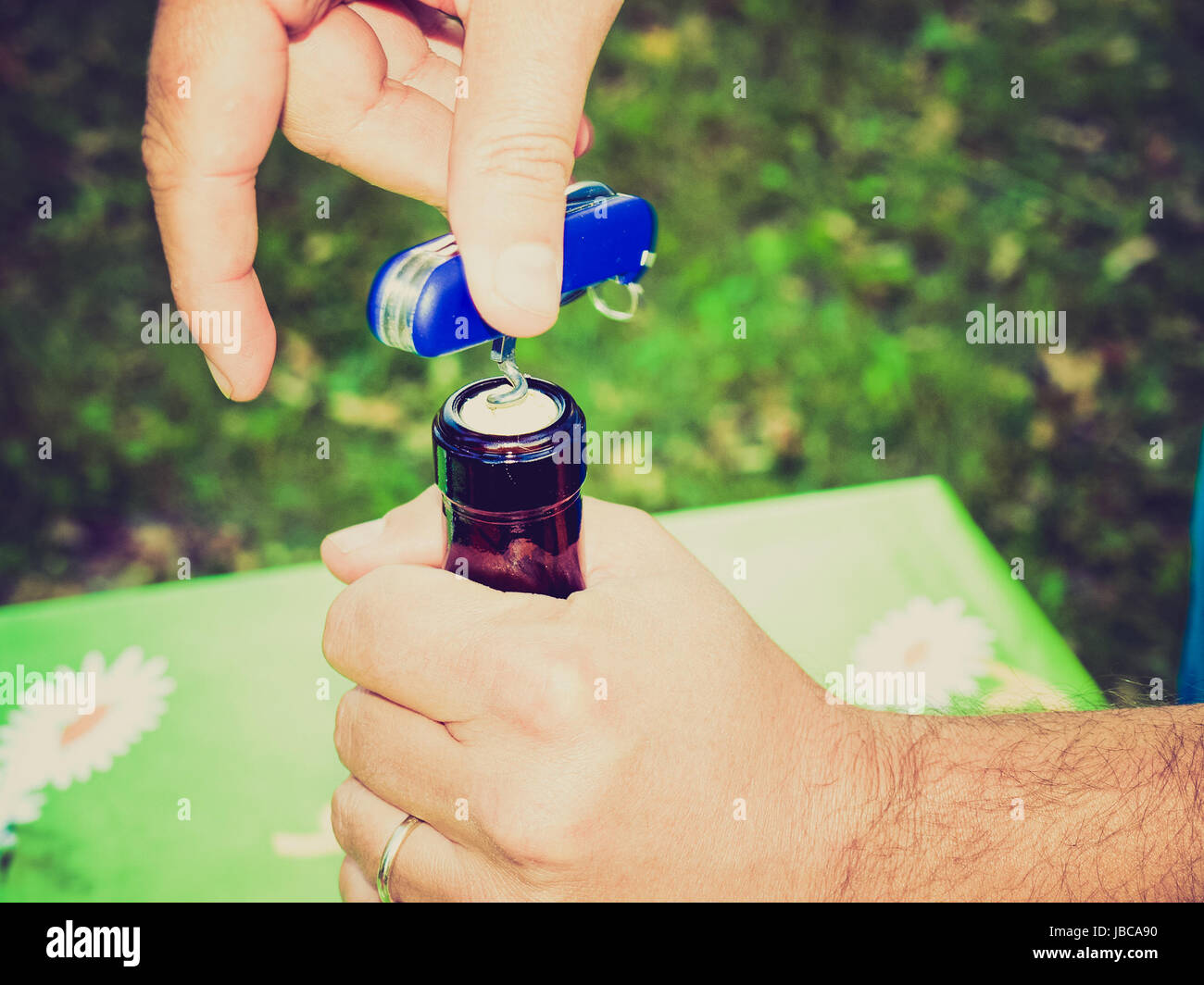 Vintage retro looking Wine bottle opening picture Stock Photo