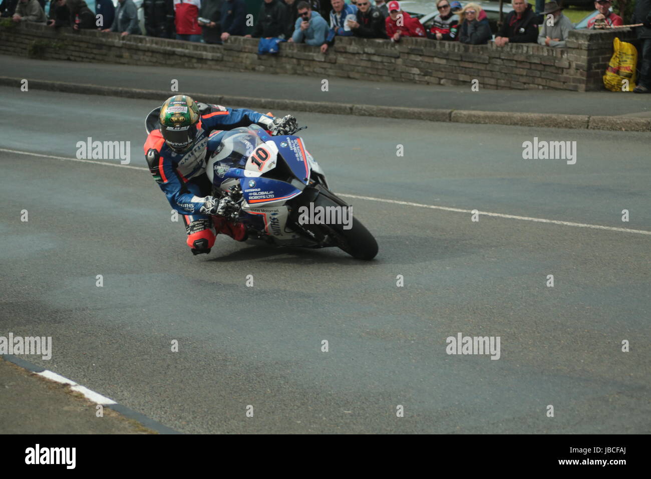 Isle Of Man, British Isles (UK). 9th June, 2017.  Fan Favorite and rising star, number 10, Peter Hickman on his BMW motorcycle of the Smiths Racing team at Cruickshank's Corner, Ramsey, Isle of Man, UK.  Peter Hickman came second in the Senior TT race in an exciting climax to the TT Races. Pokerstars Senior TT Race. (Detailed competitor information: https://www.iomtt.com/TT-Database.aspx) Credit: Louisa Jane Bawden/Alamy Live News. Stock Photo