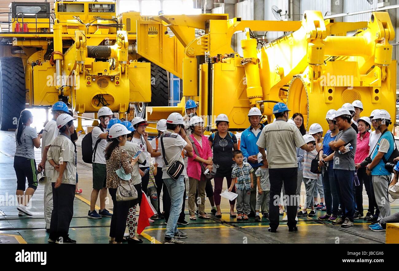 Beijing, China. 10th June, 2017. Citizens visit the CRRC Beijing Locomotive Co., Ltd in Beijing, capital of China, June 10, 2017. An open day activity was held at the 120-year-old state-owned corporation on Saturday, attracting many citizens. The corporation was found in 1897, selling its railway products of locomotives and engineering machinery to customers at home and abroad. Credit: Li Xin/Xinhua/Alamy Live News Stock Photo
