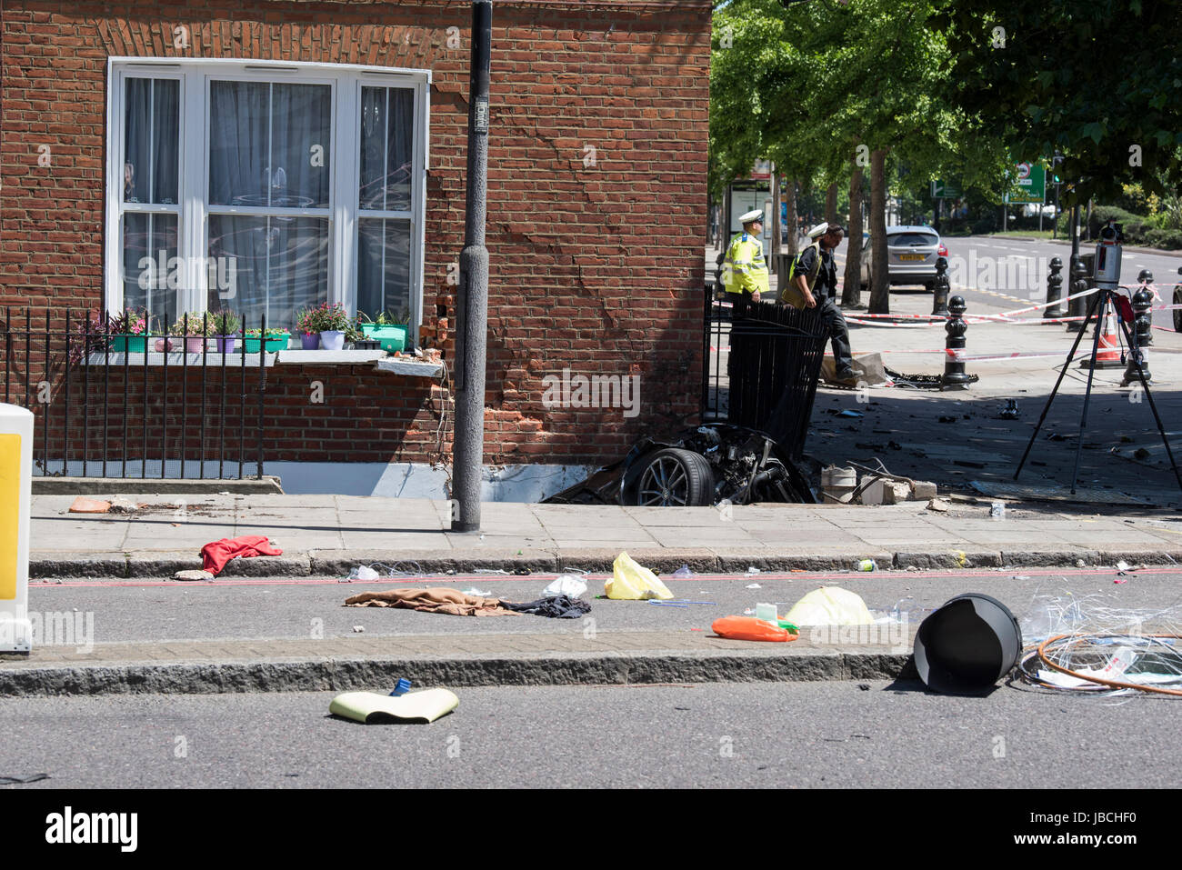 London, UK. 10th June 2017. A car crashed into a house on the corner of ...