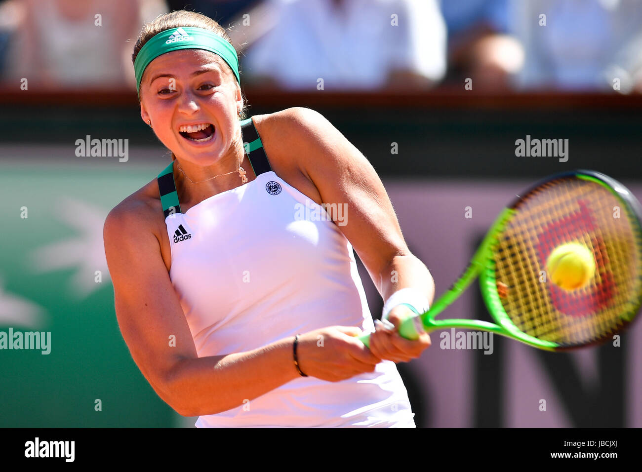 Paris, France. 10th June, 2017. Jelena Ostapenko of Latvia returns the ball to Simona Halep of Romania during the women's singles final at the French Open Tennis Tournament 2017 in Paris, France, on June 10, 2017. Credit: Chen Yichen/Xinhua/Alamy Live News Stock Photo