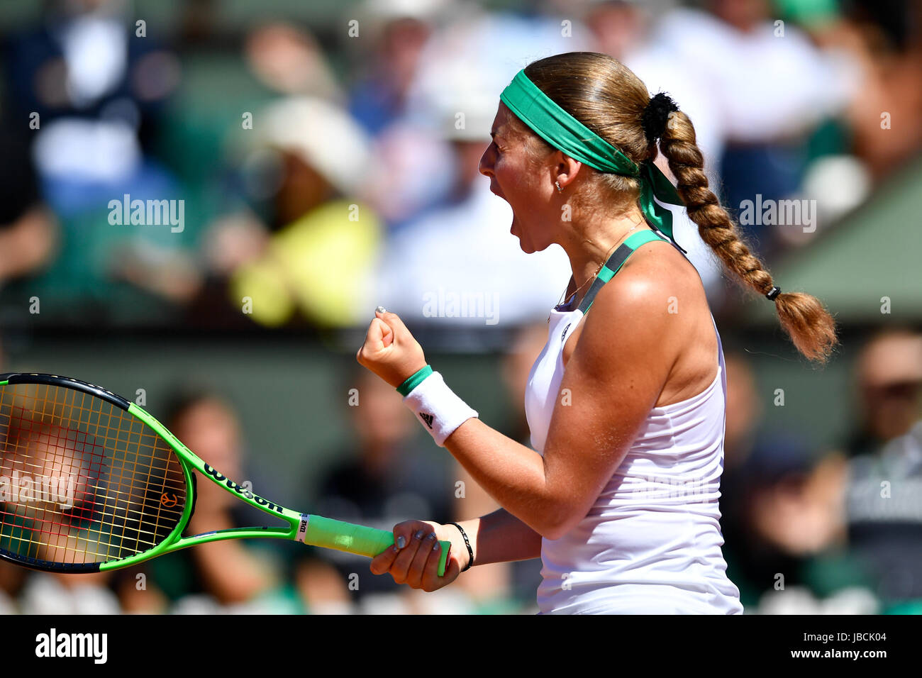 Paris, France. 10th June, 2017. Jelena Ostapenko of Latvia celebrates a point during the women's singles final against Simona Halep of Romania at the French Open Tennis Tournament 2017 in Paris, France, on June 10, 2017. Credit: Chen Yichen/Xinhua/Alamy Live News Stock Photo