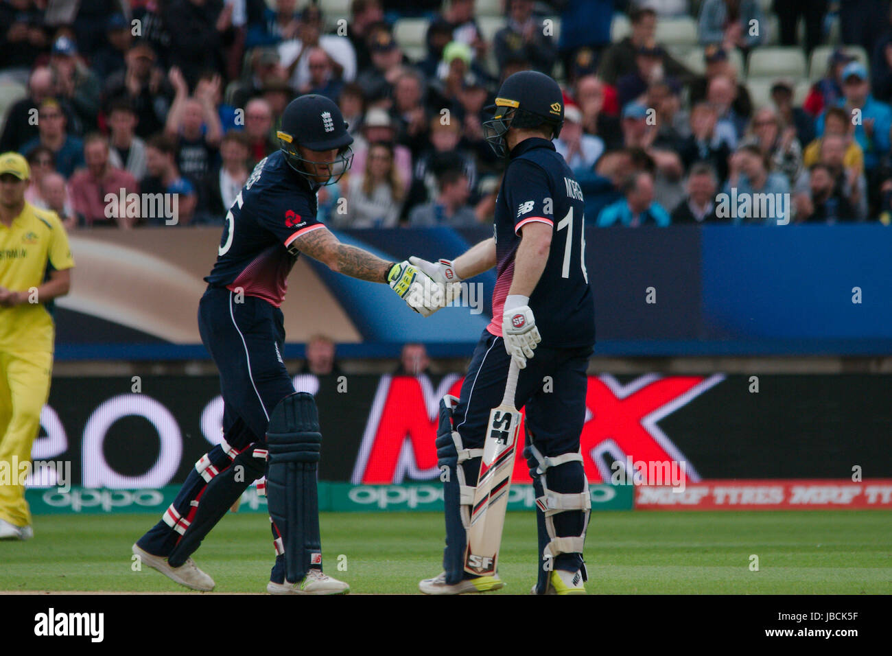 Birmingham, England, 10 June 2017. Ben Stokes, left, congratulating England Captain Eoin Morgan on reaching 50 runs against Australia in the ICC Champions Trophy Group A match at Edgbaston. Credit: Colin Edwards/Alamy Live News. Stock Photo