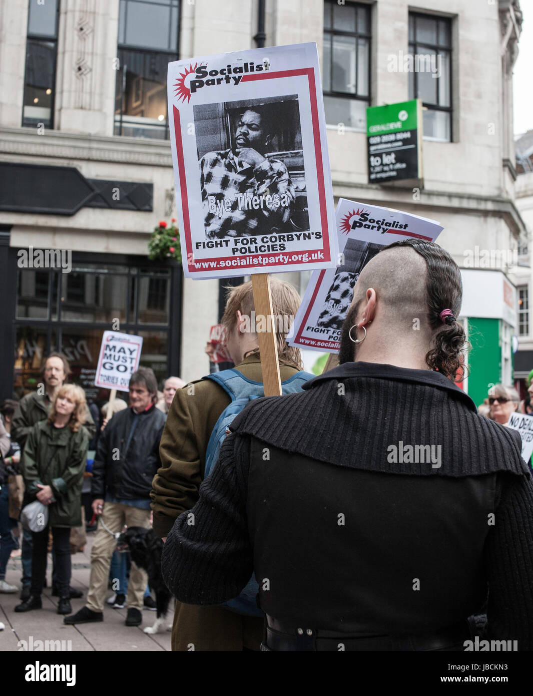 Cardiff, UK. 10th June, 2017. Calling for Conservative Prime Minister Theresa May to resign, in conjunction with other protests taking place across the UK, austerity campaigners gathered under the Aneurin Bevan stature in Cardiff City centre, where there were speeches by activists and a march across Queen Street. Taz Rahman/Alamy Live News Stock Photo