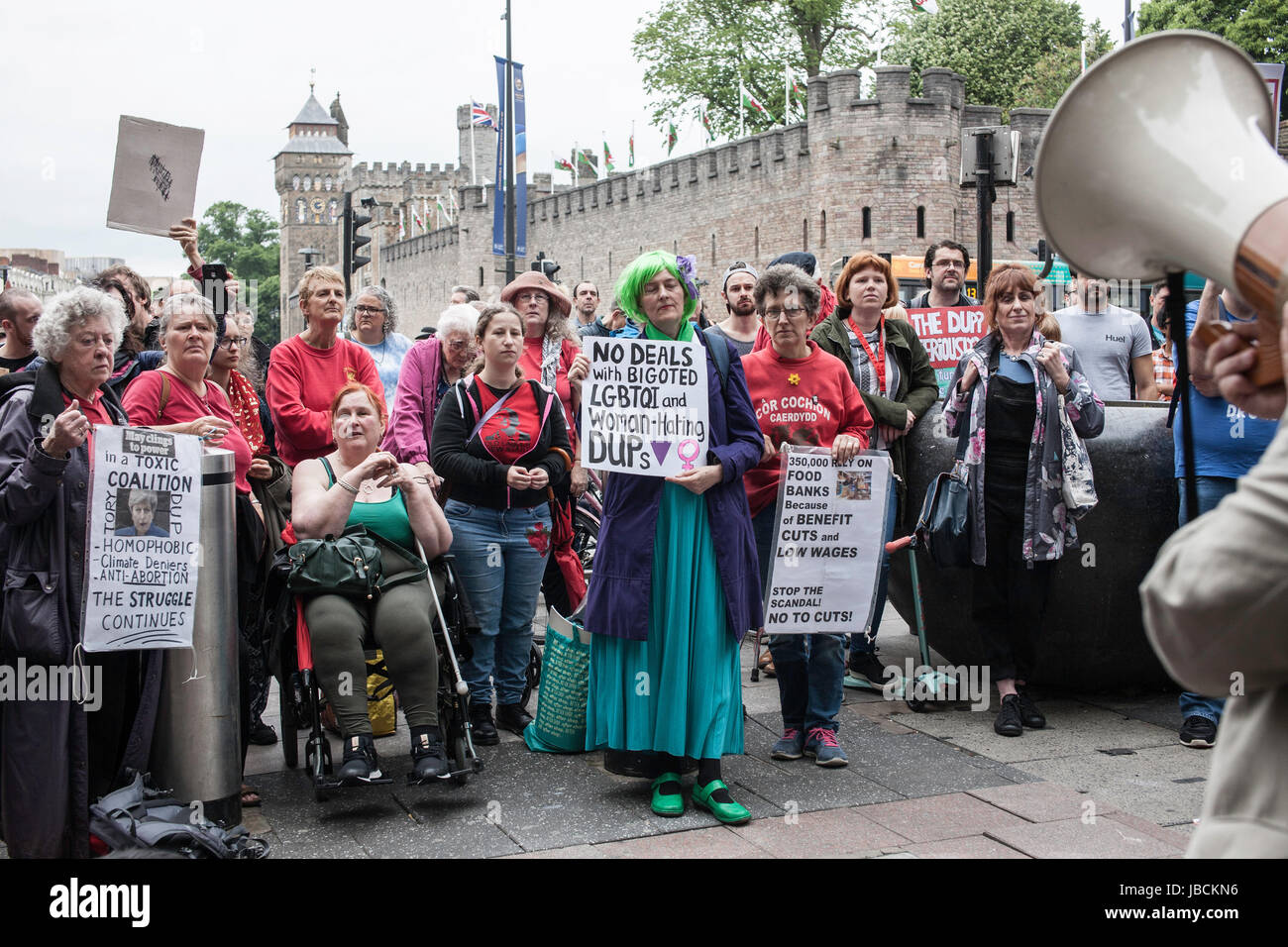 Cardiff, UK. 10th June, 2017. Calling for Conservative Prime Minister Theresa May to resign, in conjunction with other protests taking place across the UK, austerity campaigners gathered under the Aneurin Bevan stature in Cardiff City centre, where there were speeches by activists and a march across Queen Street. Taz Rahman/Alamy Live News Stock Photo