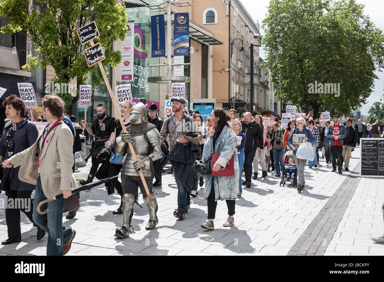 Cardiff, UK. 10th June, 2017. Calling for Conservative Prime Minister Theresa May to resign, in conjunction with other protests taking place across the UK, austerity campaigners gathered under the Aneurin Bevan stature in Cardiff City centre, where there were speeches by activists and a march across Queen Street. Taz Rahman/Alamy Live News Stock Photo