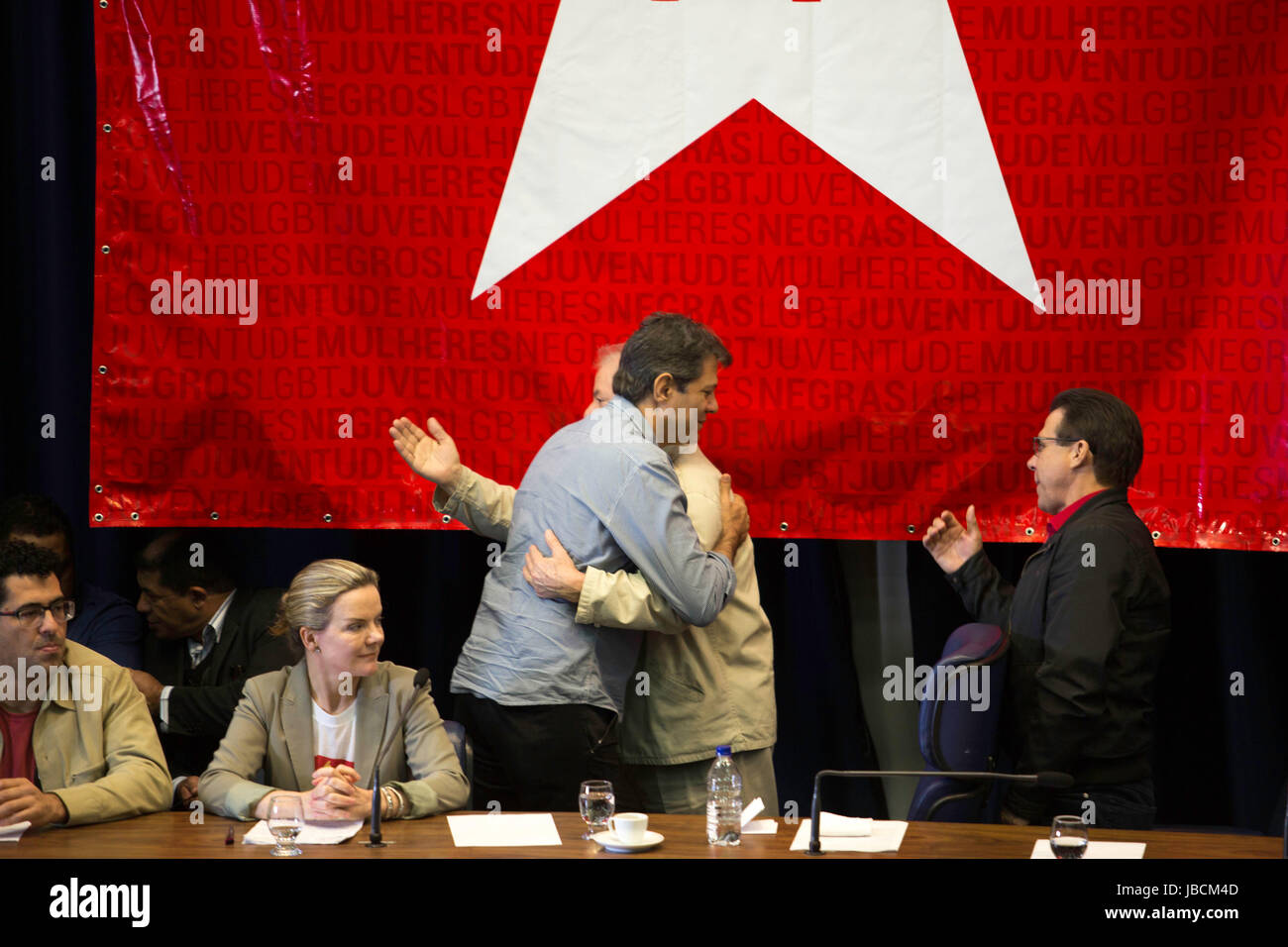 SÃO PAULO, SP - 10.06.2017: NOVO DIRET'RIO PT TOMA POSSE EM SÃO PAULO - Former mayor Fernando Hadad and former president Lula greet each other during a swearing-in ceremony for the new state&#39;s Workers&#39; Party headquarters on Saturday morning at ALESP. (Photo: Bruno Rocha/Fotoarena) Stock Photo