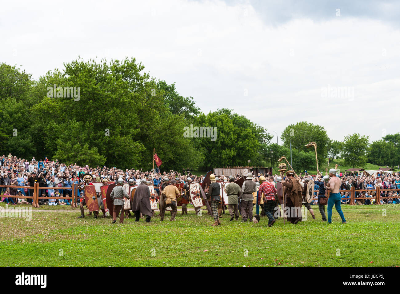 Moscow, Russia. 10th June, 2017. International Times & Epochs history reenactment festival in under way in Moscow. About 6000 reenactors from around the world take part in this 12 day long festival. They represent many history periods from times of ancient Greece and Rome to XX century on more than 15 festival areas all over the city. Ancient Rome period everyday life scenes, gladiator games, battles with Germans and Dacians and other events are presented in Kolomenskoe public park. Teutoburg forest battle. Roman legions fall under German attack. Credit: Alex's Pictures/Alamy Live News Stock Photo