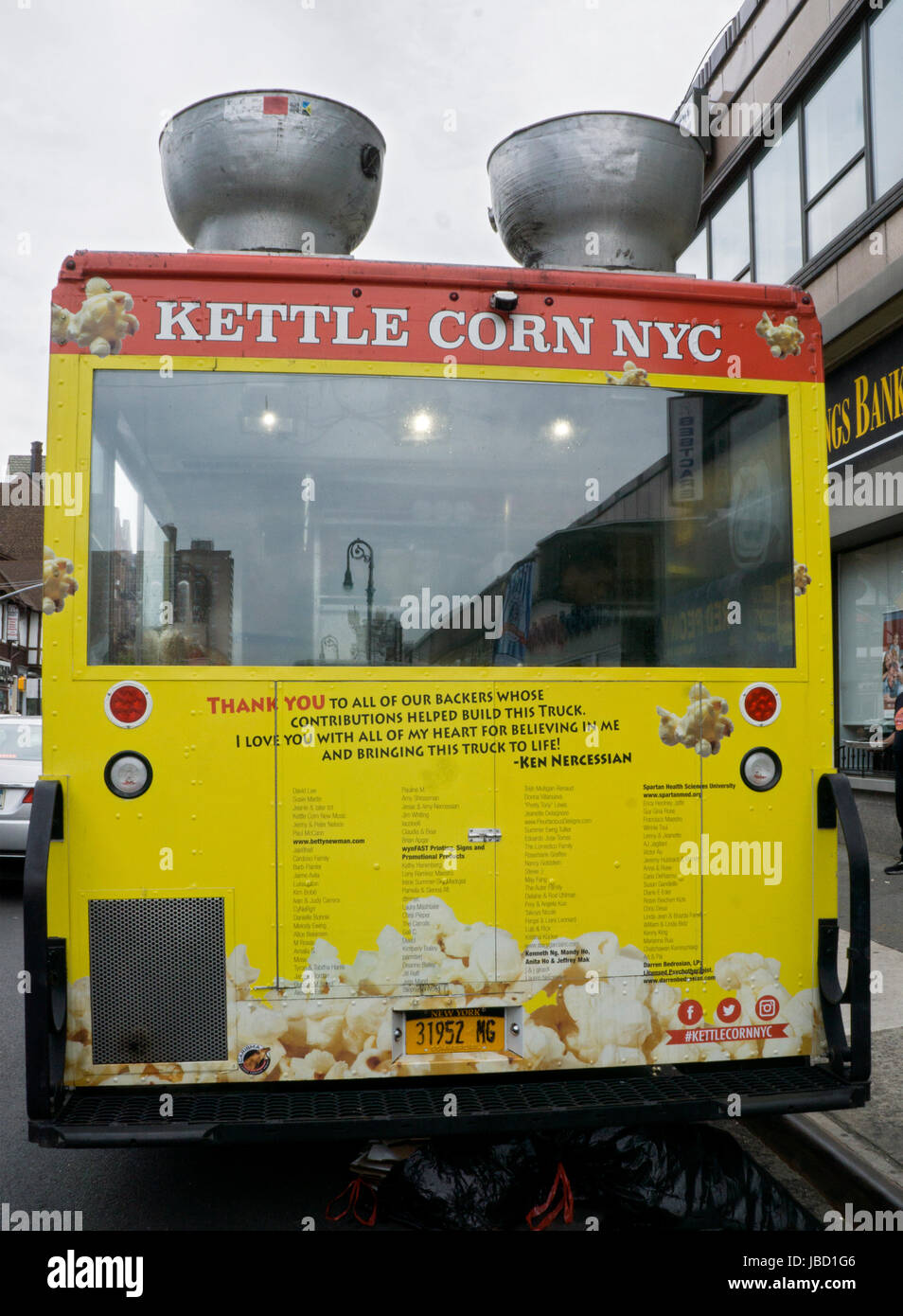 The back of a Kettle Corn food truck thanking all the people whose contributions helped build it. On Austin St. in Forest Hills, Queens, New York. Stock Photo