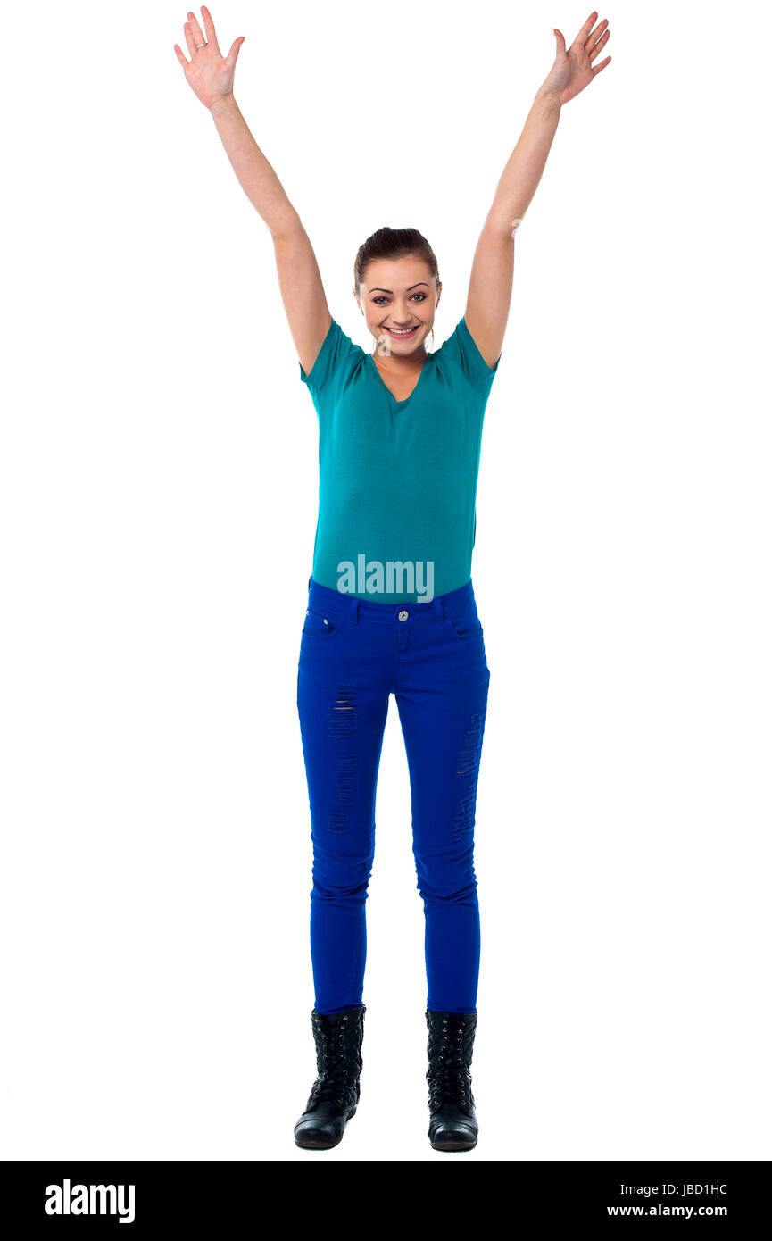 Excited woman throwing her hands up in the air Stock Photo Alamy