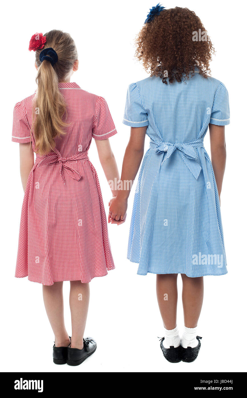 School girls holding hands, rear view shot Stock Photo - Alamy