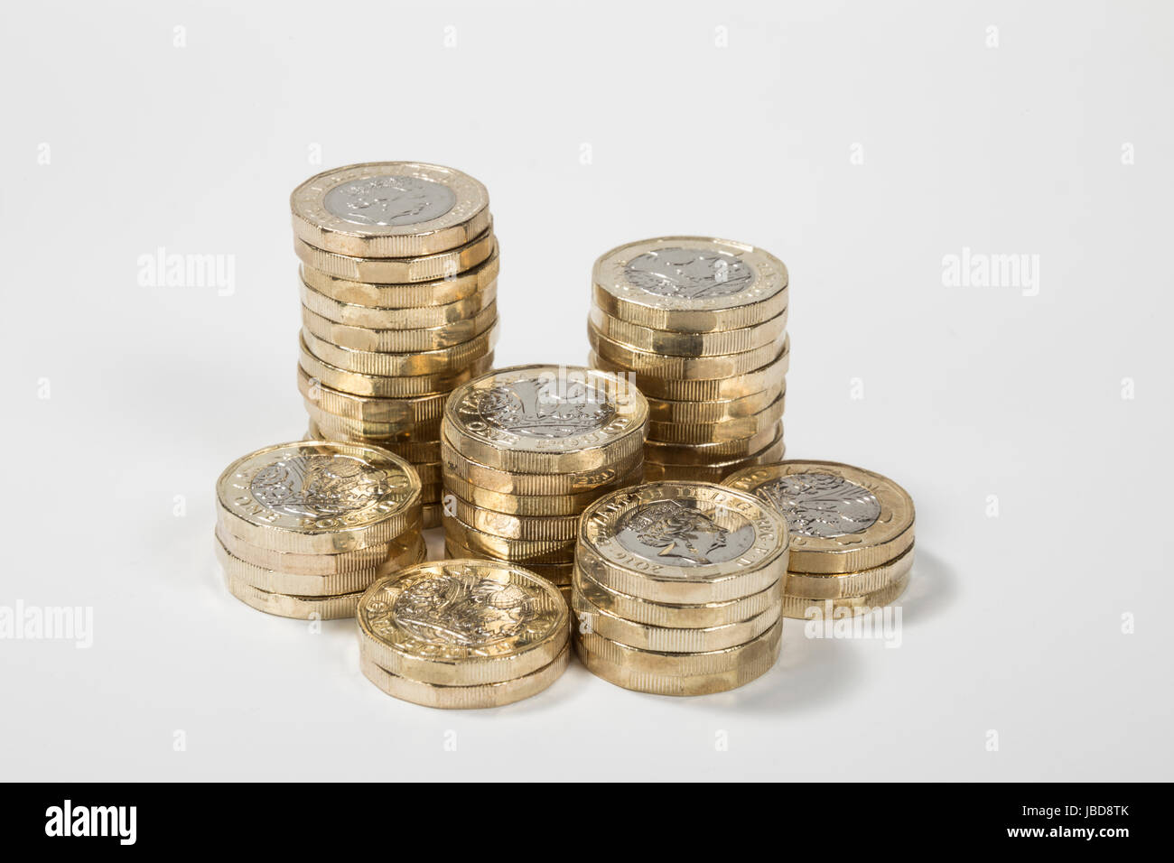 New UK British Pound coins in vertical piles Stock Photo