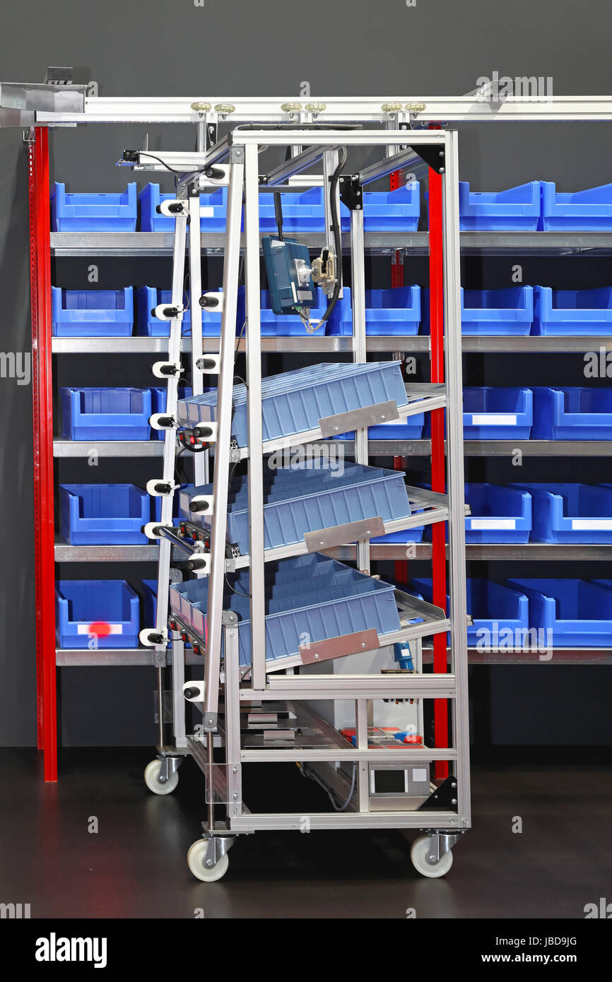 Sorting bins and cart in mail order distribution warehouse Stock Photo Alamy