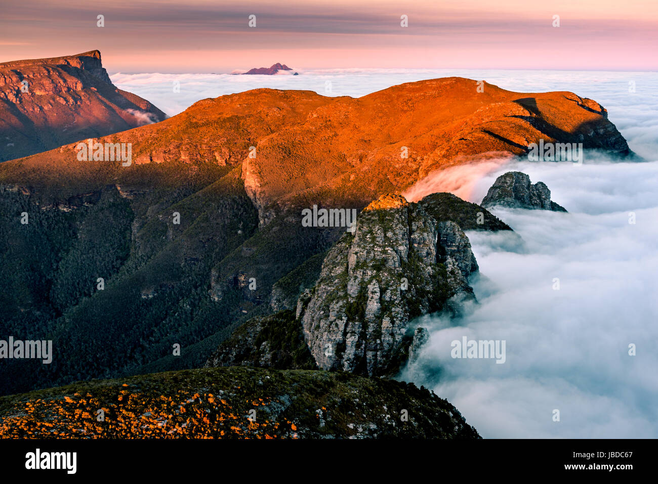 Sunrise at  the top of Pyungoorup Peak in Stirling Range, Western Australia. View toward the Bluff Knoll. Stock Photo