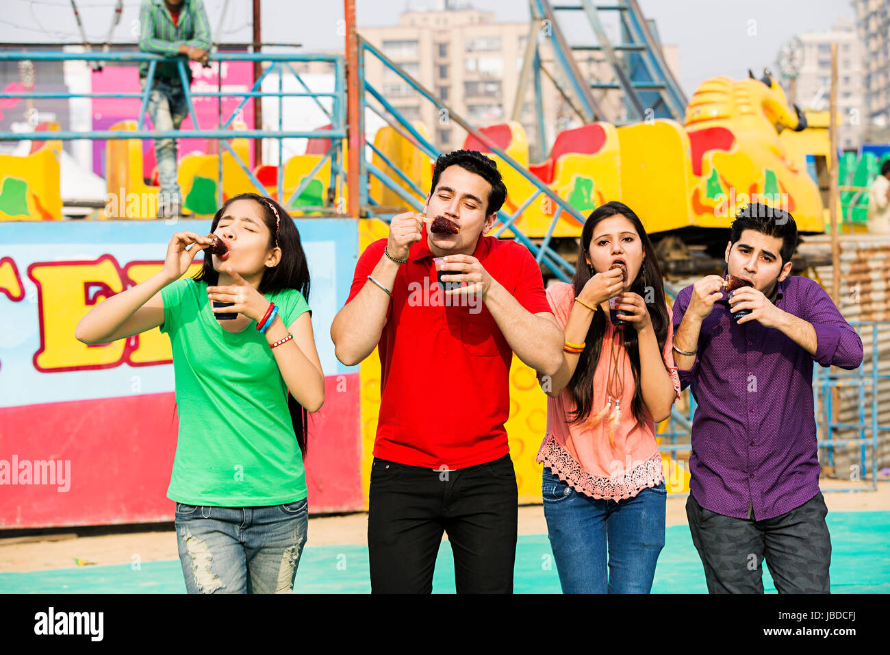 4 Teenager Friends Eating Delicious Ice Cream Enjoying Mela Surajkund Stock Photo