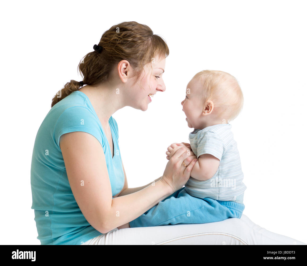 Portrait of mother and baby son laughing and playing Stock Photo