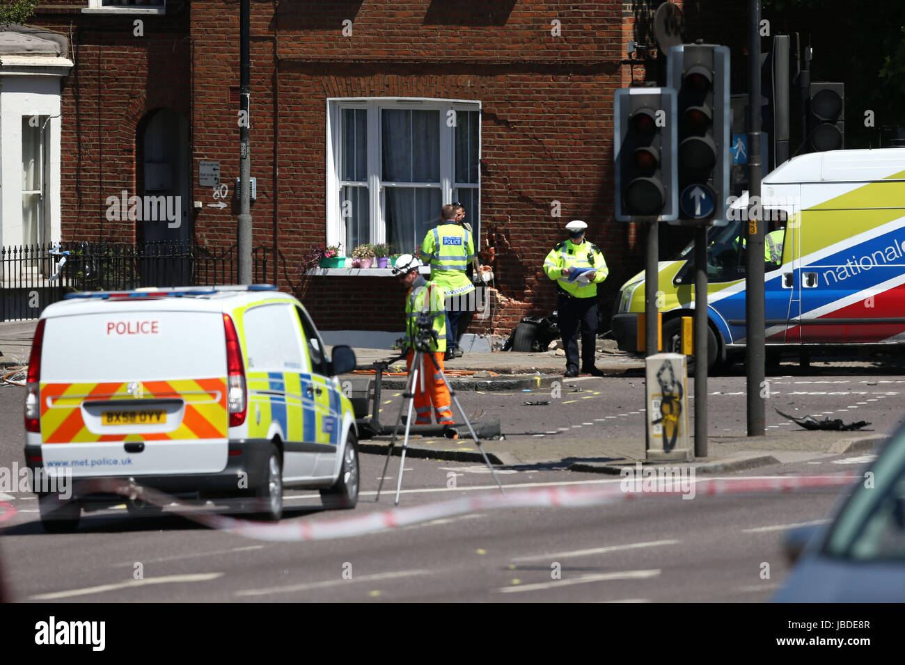Police At The Scene Of A Car Crash In Kensington London Where A Man police-at-the-scene-of-a-car-crash-in-kensington-london-where-a-man