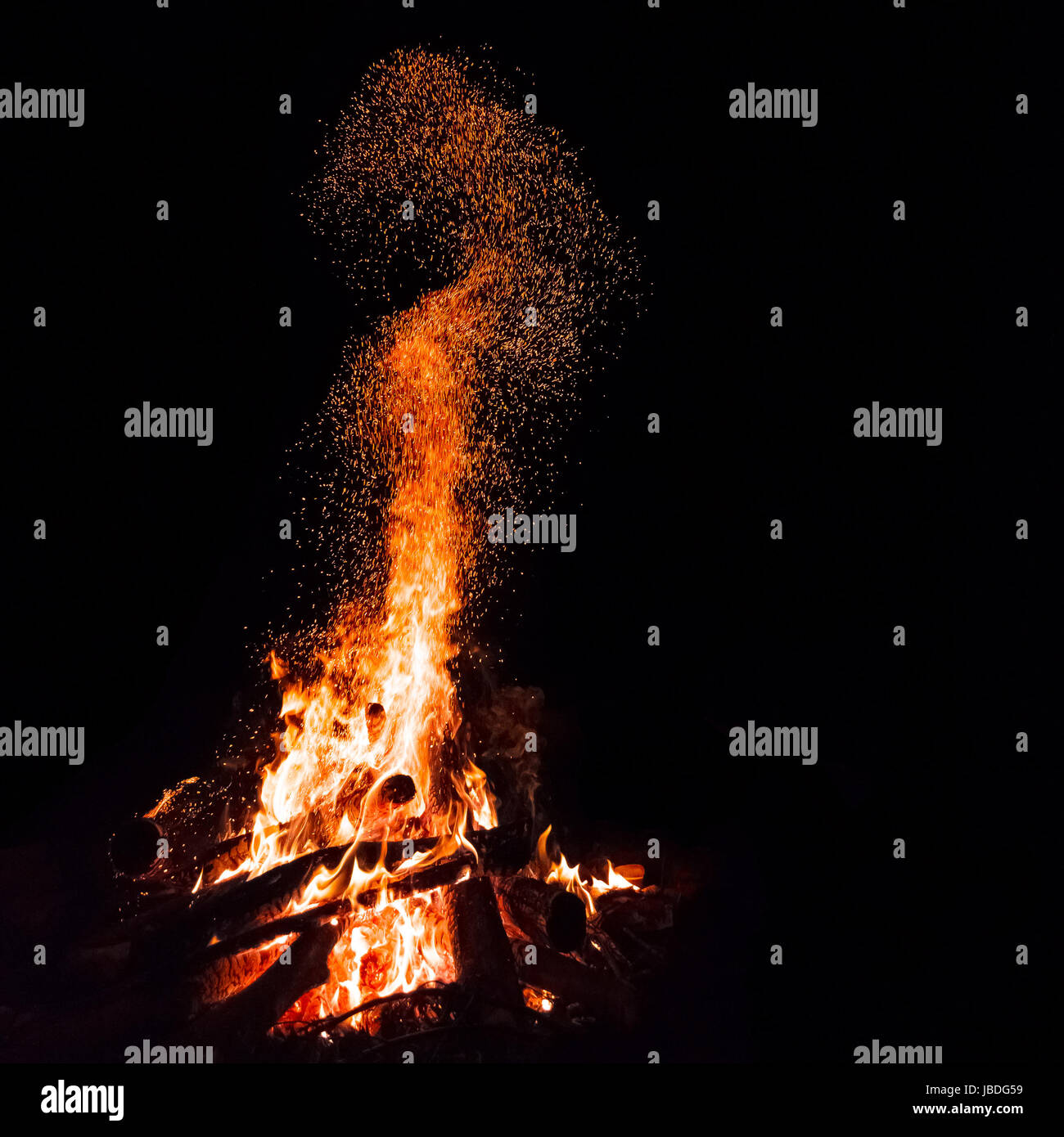 Campfire with flying sparks isolated on black background Stock Photo ...