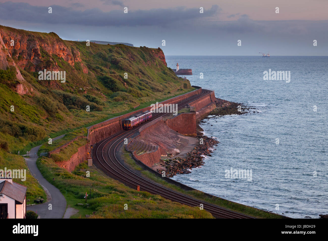 20.15 Carlsle - Whitehaven Northern rail train passes Parton, near Whitehaven, UK 3/6/2017 Stock Photo