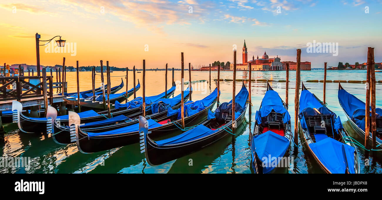 Venice with famous gondolas at sunrise, Italy Stock Photo - Alamy