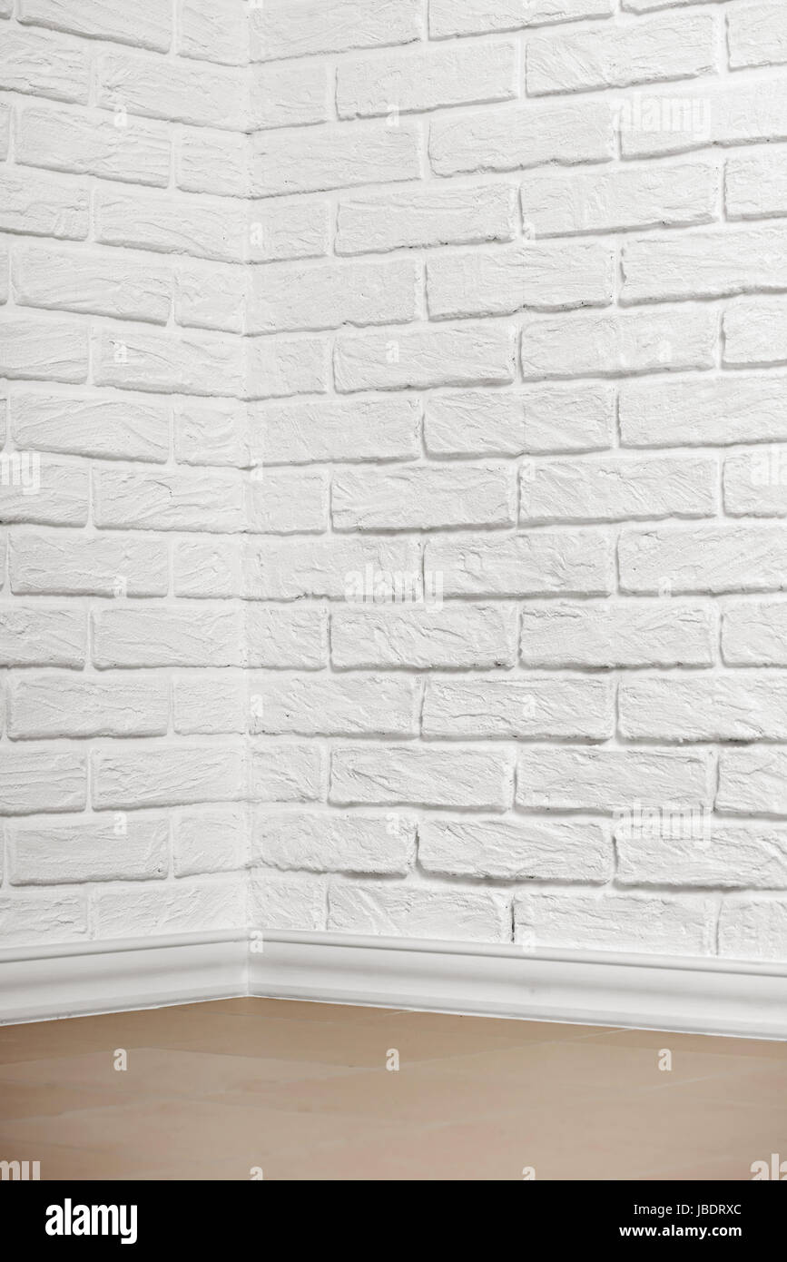 white brick wall with tiled floor and corner, abstract background photo ...