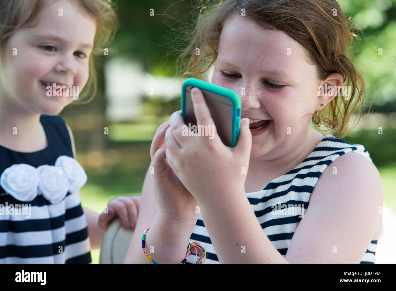 Happy laughing children hi-res stock photography and images - Alamy