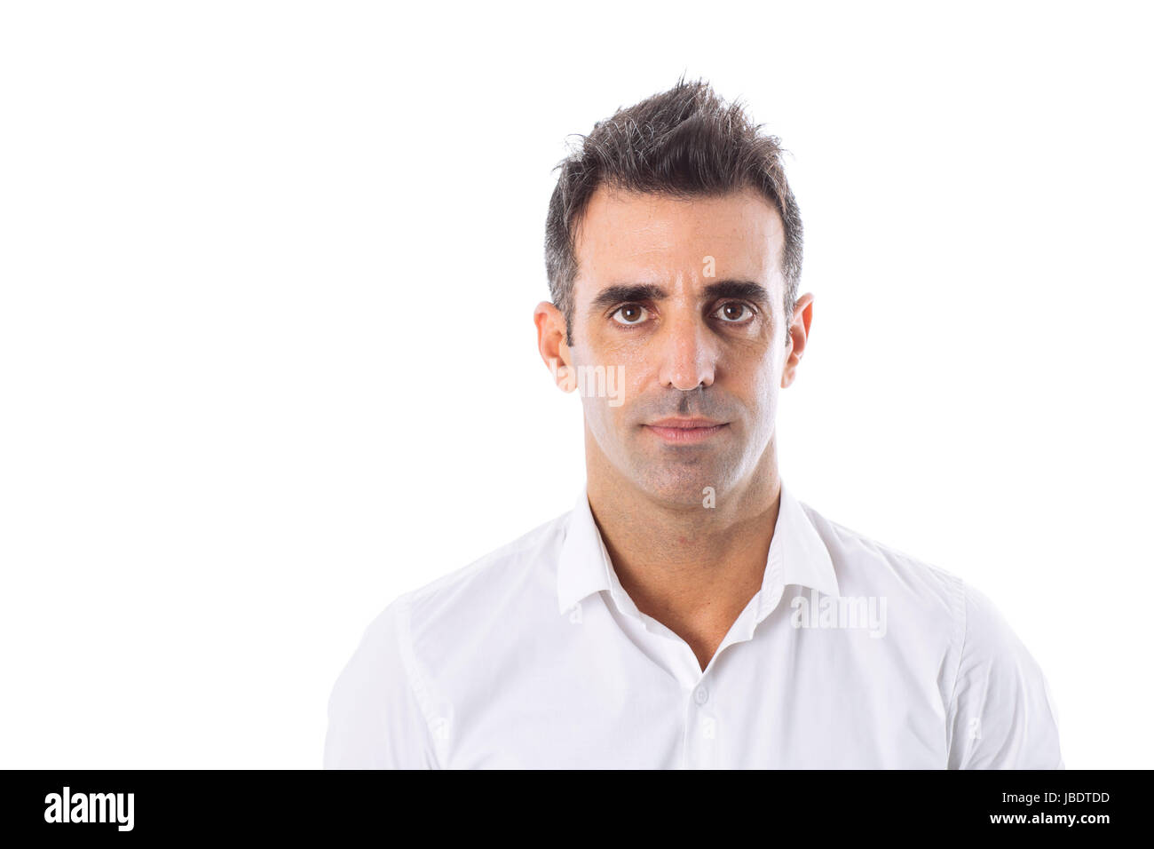 A 35 - 40 years old man probably a CEO caucasian dark hair cool modern look a serious face studio shot with white background Stock Photo