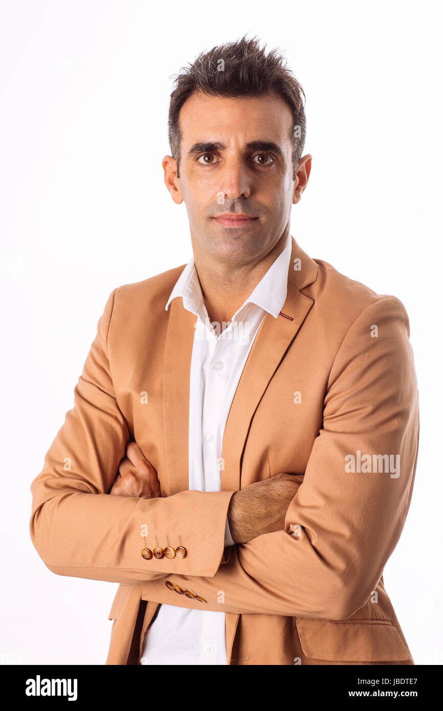 A 35 - 40 years man caucasian dark hair cool modern informal look blazer, arms folded white background studio Stock Photo