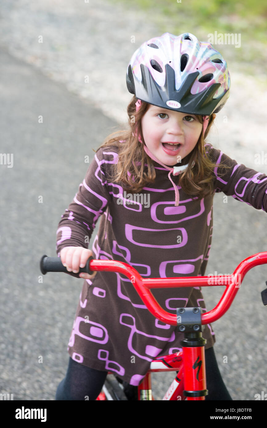 Young Girl Riding Bike on paved trail Stock Photo Alamy