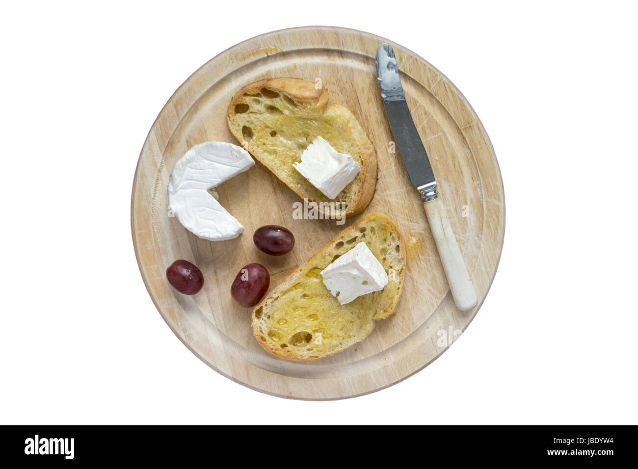 Toasted Sourdough and Goats Cheese on a bread board Stock Photo Alamy