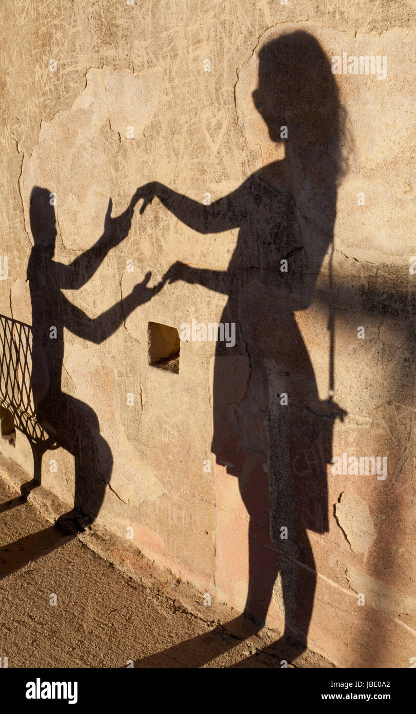 Shadows of two people. Bonifacio, Corsica, France. Stock Photo