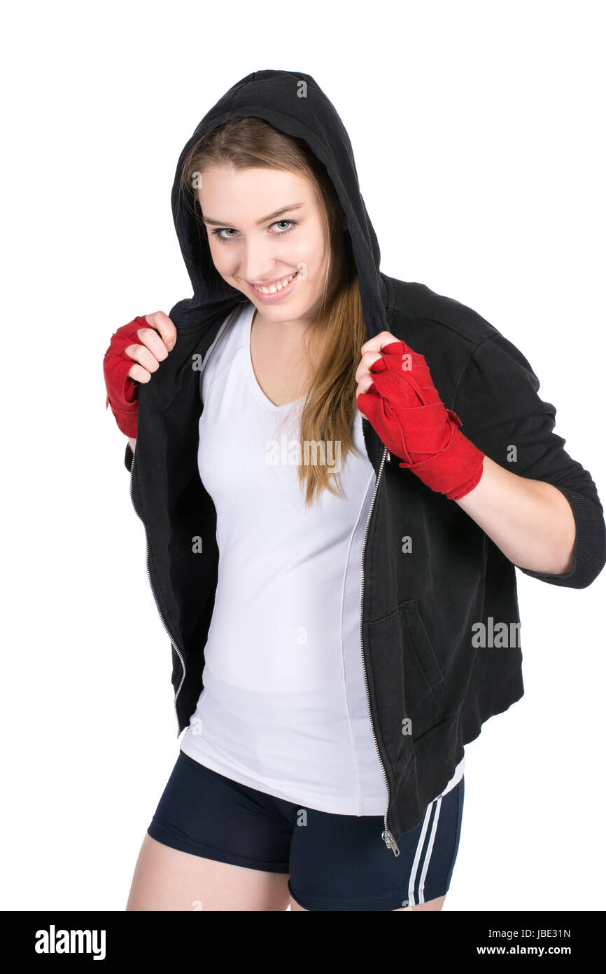 Freigestelltes Foto einer jungen Boxerin im Kapuzenpulli und mit bandagierten Händen Stock Photo