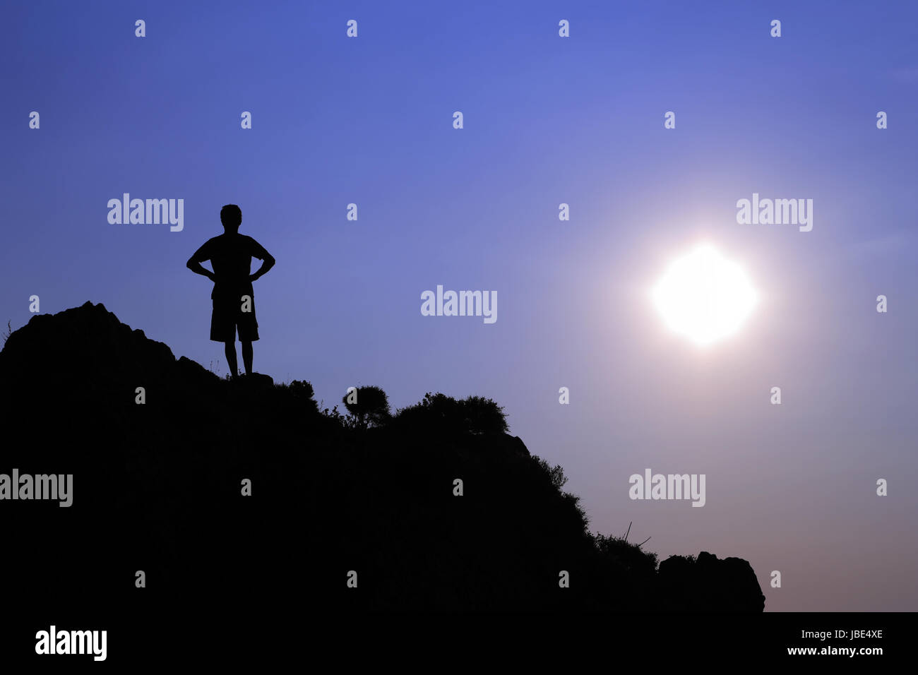 Man in contrejour by Sunset, Piana, Corsica, France Stock Photo