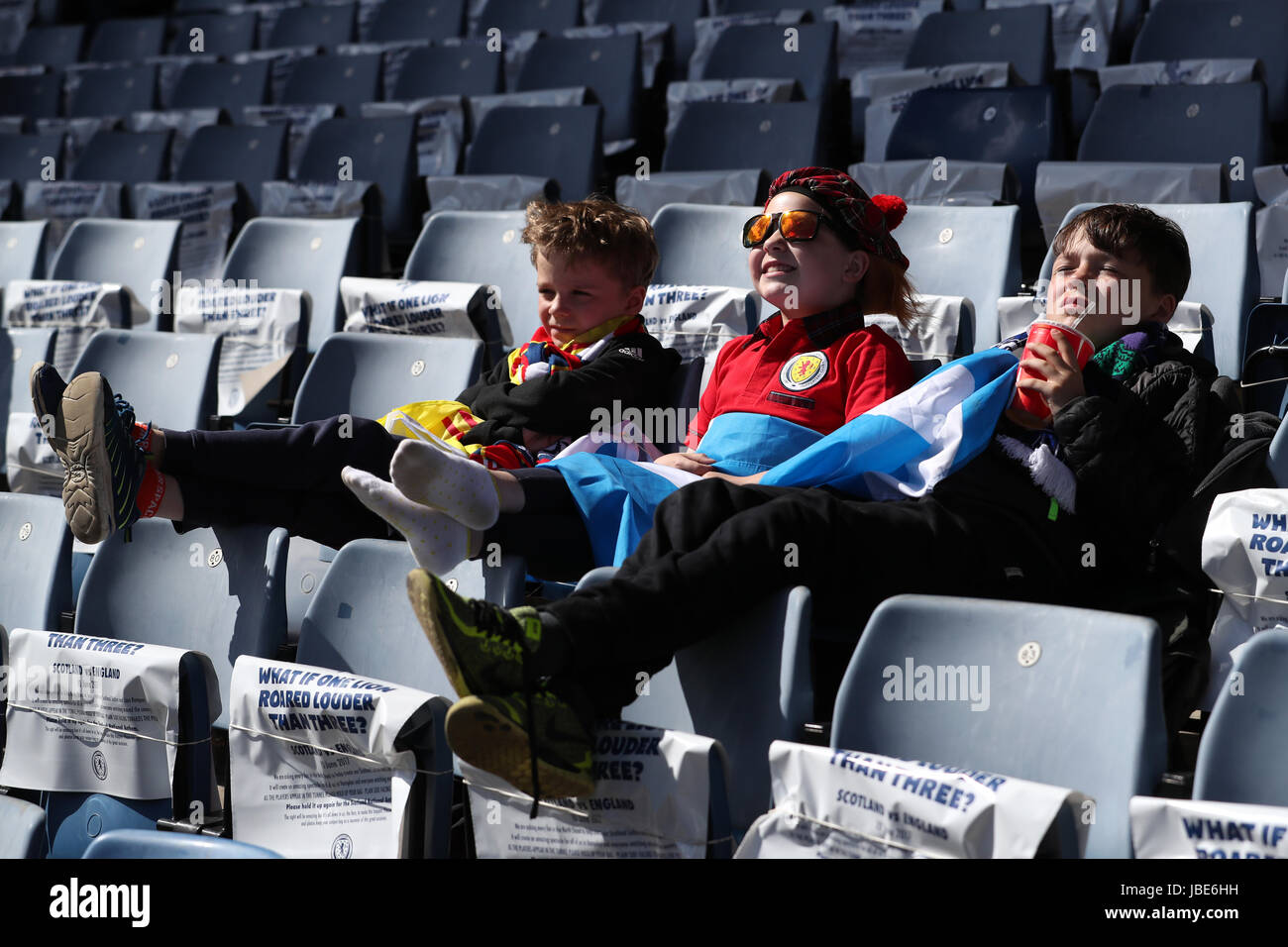 Scotland supporters Ethan, Roma and Oliver before the 2018 FIFA World Cup qualifying, Group F match at Hampden Park, Glasgow. Stock Photo