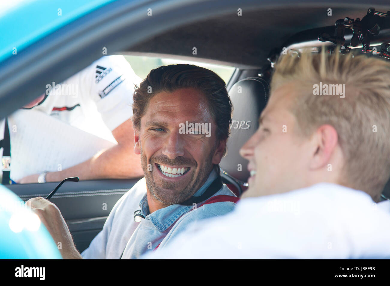KARLSKOGA, SWEDEN. 14th AUGUST 2016. Hockey player  Henrik Lundqvist and racing driver Marcus Ericsson in a car after a race. Stock Photo