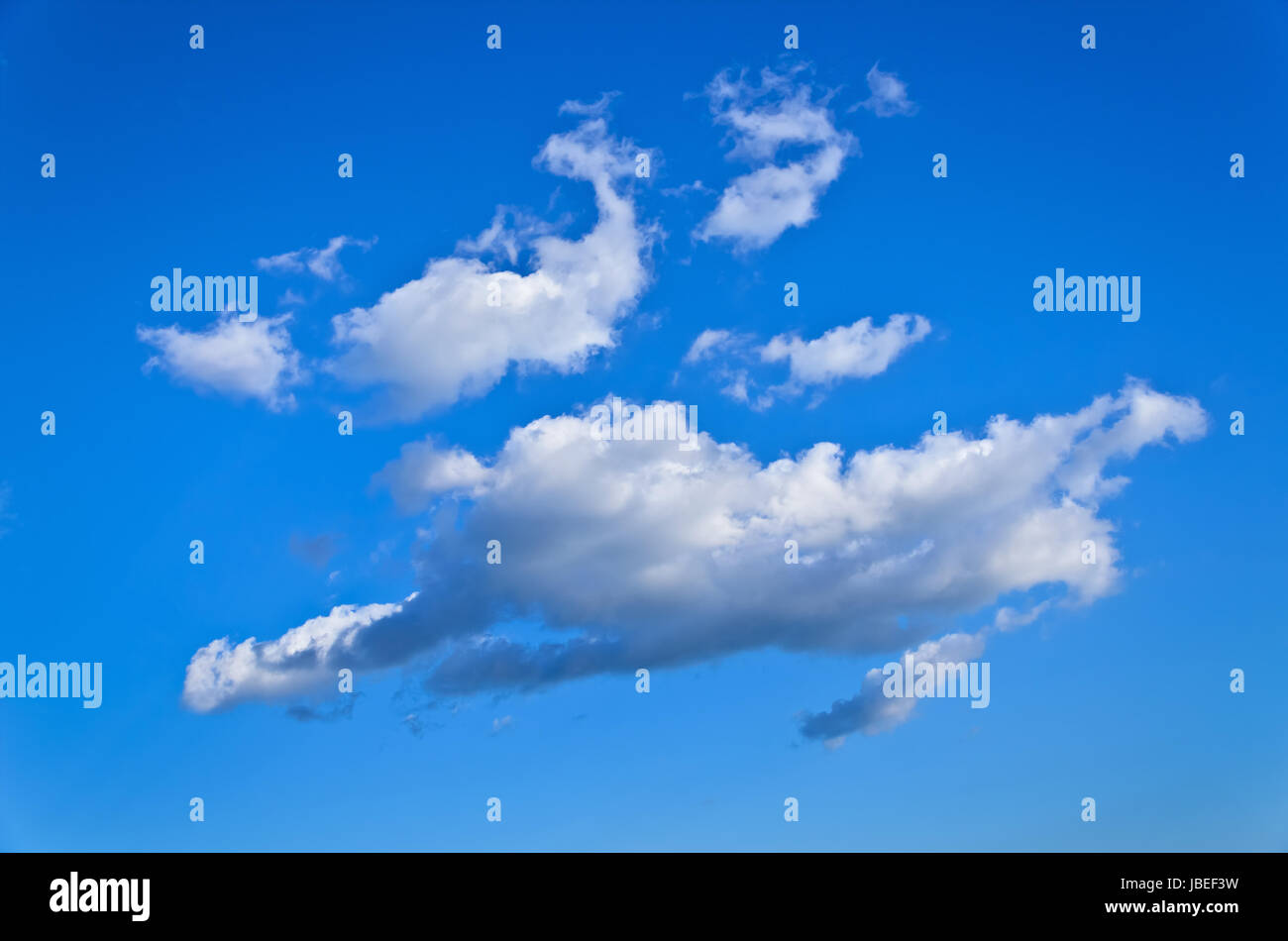 Cumulus Clouds In The Blue Sky Stock Photo - Alamy